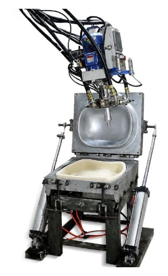 PU MOB injection head above an open mould